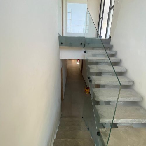 Fixado com botton prolongador